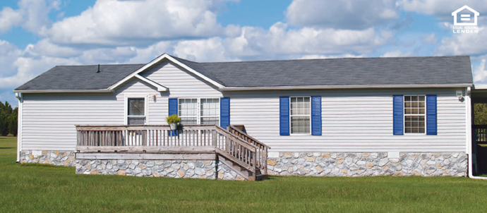 white manufactured home, blue shutters, porch, blue skies