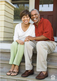 older couple sitting front steps